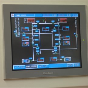 view of programmable logic controller (PLC) program set up on HMI screen.